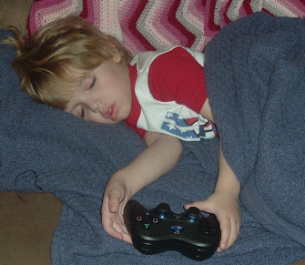 http://www.videogamesblogger.com/wp-content/uploads/2008/08/next-generation-of-extreme-gamers-sleeping-kid.jpg