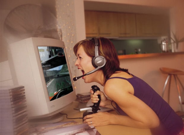 Girl screams at computer. Just like the retail stores in relation to PC sales Girl screams at computer. Just like the retail stores in relation to PC sales