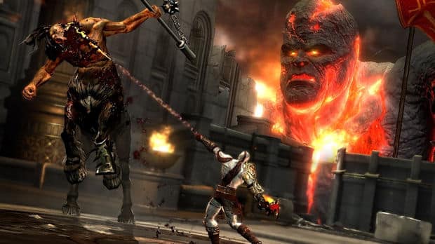 God of War 3 screenshot of Kratos fighting and a Titan in the background