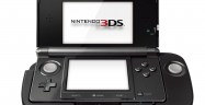 3DS Slide Pad Expansion Pic Showing How the Device Cradles the Full System 3DS Slide Pad Expansion Pic Showing How the Device Cradles the Full System