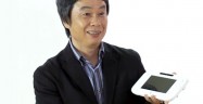 Shigeru Miyamoto holding Wii U controller