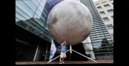 Skyscrapers, a moon, and OK Go Skyscrapers, a moon, and OK Go